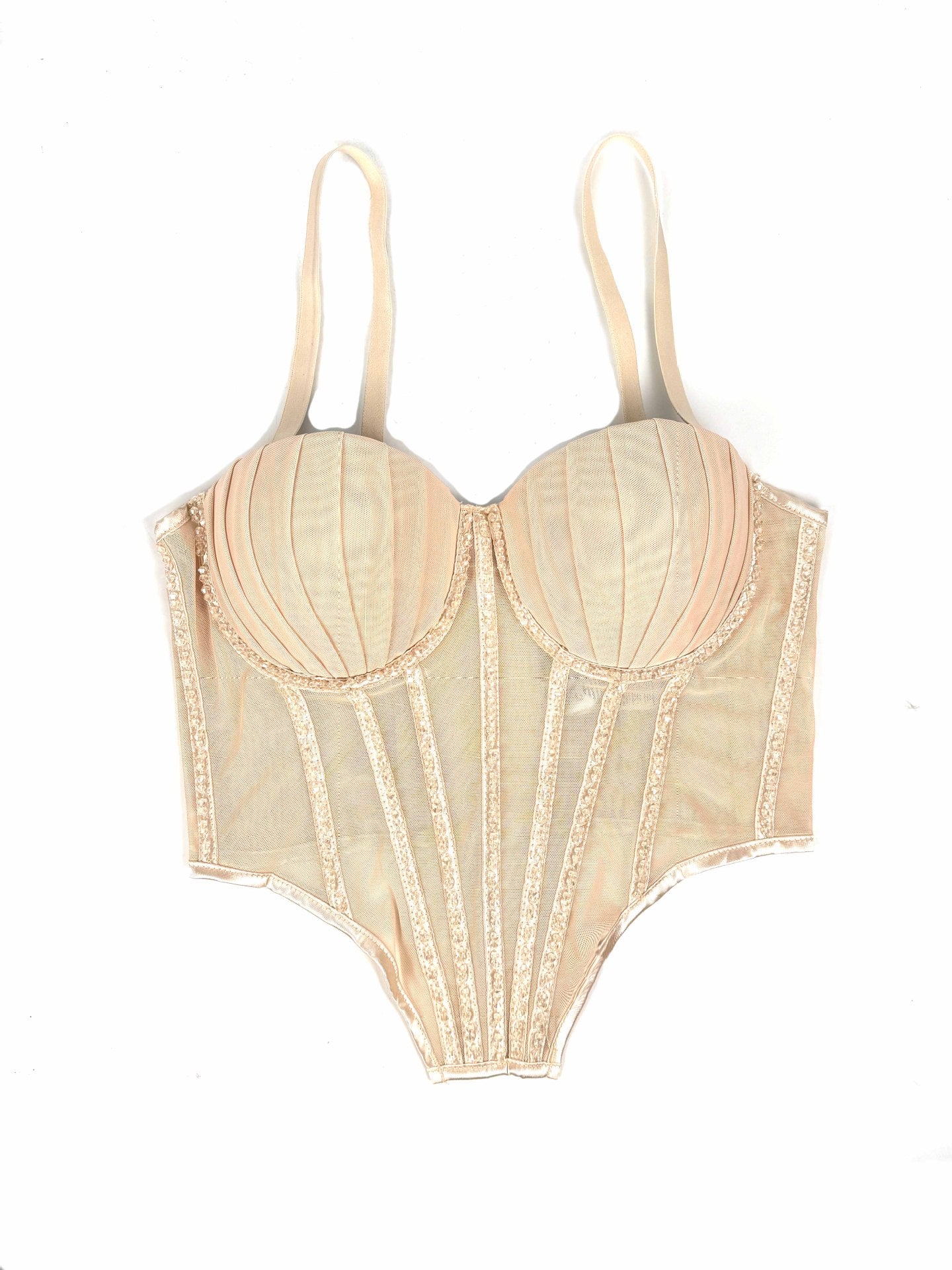 La malla sexy con aparatos ortopédicos y almohadilla para los senos se puede usar fuera del sujetador de plástico de espina de imitación