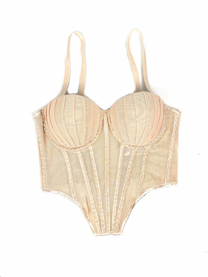 La malla sexy con aparatos ortopédicos y almohadilla para los senos se puede usar fuera del sujetador de plástico de espina de imitación